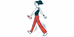 A woman is shown walking, carrying a baton or hand weight.