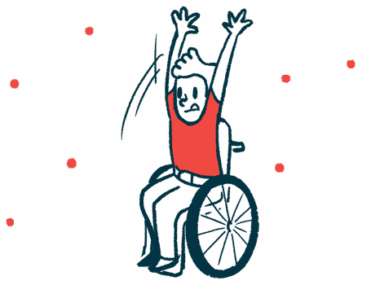 A child in a wheelchair raises his arms above his head.