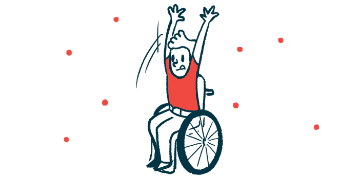 A child in a wheelchair raises his arms above his head.