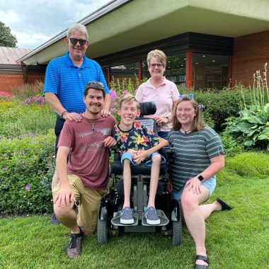 How to become successful | SMA News Today | The Soule family poses outdoors in front of a garden and some type of building in the background.