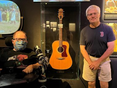lessons from my father | SMA News Today | Kevin and his dad pose on either side of Phoebe's guitar from the TV show "Friends," displayed at the Warner Bros. Studio