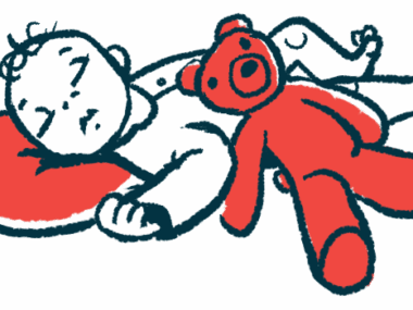 A baby is seen sleeping with a red teddy bear.