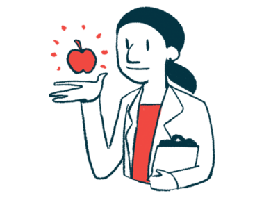 A doctor bounces a red apple in her hand.