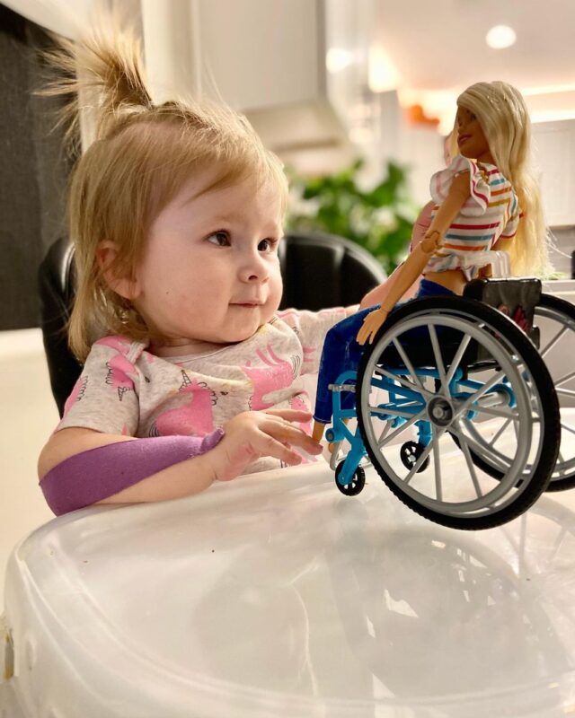 Stella with Barbie doll