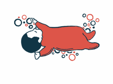 An infant is shown sleeping.