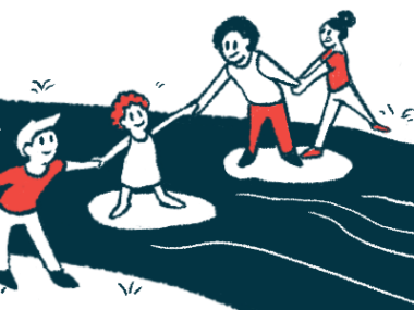 Children work together, holding hands, to cross a river using stepping stones.