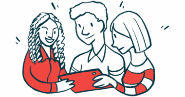 Three people look at a tablet.
