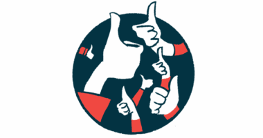 A group of hands are shown in a circle giving a thumbs-up sign.