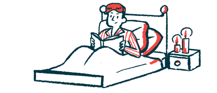 A person sits in bed reading a book.