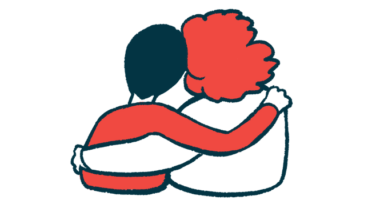 Two people are shown from behind with their arms around each other.